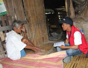 Listahanan Enumerator Albin Tuco interviews couple Petronila and Zacarias Jadol, both social pension beneficiaries of Barangay Gabi, Compostela town.