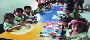 Children at the Luzviminda Yakap Day Care Center, enjoy their nutritious meal. 