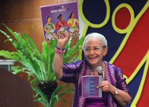     PCW Chairperson Remedios Rikken holds up the "Empowered Women, Gendered Communities" coffee table book of Kalahi-CIDSS, which was also launched in the "Empowering Women, Empowering Communities" event, held last May 3.     The coffee table book provides a snapshot of the gender mainstreaming gains of the KC-MCC project.