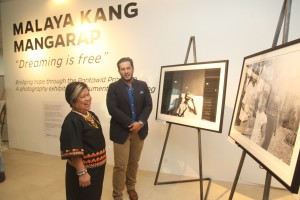 Sec. Soliman and Photographer Francisco Guerero engage in light banter while viewing the photos.