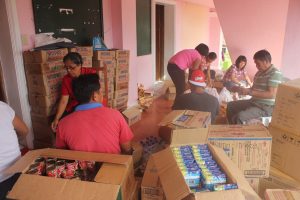 Volunteers and staff from the Department of Social Welfare and Development (DSWD) Field Office II continue to repack relief goods for distribution to families affected by Typhoon 'Ferdie' in Batanes.