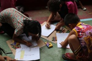 Children displaced by the armed conflict in Marawi City undergo psycho-social processing by drawing pictures inside one of the child and women friendly spaces set up by the Department of Social Welfare and Development (DSWD) in coordination with the local government of Iligan City and partner international humanitarian organizations.