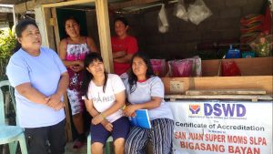 Members of San Juan Super Moms SLPA managing their rice retail business in Pantabangan, Nueva Ecija.