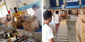 Volunteers help repack relief goods at DSWD National Resource Operations Center in Chapel Road, Pasay City using the Department’s mechanized production system. The relief goods will be delivered to areas severely affected by ‘Ulysses’.