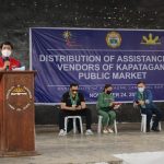 Department of Social Welfare and Development (DSWD) Secretary Rolando Joselito D. Bautista delivers his message for beneficiaries of financial assistance at Kapatagan Public Market.