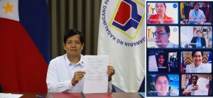 DSWD Secretary Rolando Joselito Bautista and representatives from the different government agencies show the signed memorandum of agreement for three significant convergence projects to address hunger and poverty during the ceremonial signing on September 28.
