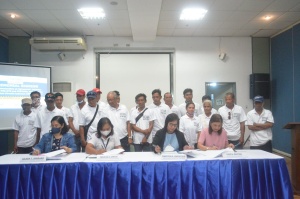 Representatives from Department of Social Welfare and Development, Department of Agriculture-Philippine Carabao Center (DA-PCC), Department of Trade and Industry (DTI), and the Commission on Population and Development (POPCOM) sign the Memorandum of Agreement (MOA) on the Expanded Gatasang Kalabaw Convergence Project, and the Joint Memorandum Circular (JMC) on KAIBIGAN Convergence Project