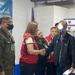 Department of Social Welfare and Development (DSWD) Assistant Secretary Dianne Rose Cajipe hands over the Department’s financial assistance to a former private armed group member in Camp Datu Akilan Ampatuan, Brgy. Poblacion Mother, Shariff Aguak, Maguindanao, on Monday, January 30.