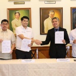 Department of Social Welfare and Development (DSWD) Officer-in-Charge Eduardo M. Punay (2nd from left) and UP Law Center Dean Edgardo Carlo Vistan II (2nd from right), together with DSWD Operations Group Undersecretary Jerico Francis Javier (left) and Department of Foreign Affairs - Office of Treaties and Legal Affairs Assistant Secretary Roussel Reyes (right), present the signed Memorandum of Agreement on the implementation of the Convention of 23 November 2007 on the International Recovery of Child Support and Other Forms of Family Maintenance right after the agreement signing on Monday, January 30 at the UP Diliman College of Law.