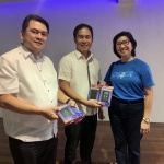 DSWD Information and Communication Technology Management Service Director Andrew Ambubuyog (center) receives five pocket wifi units from Globe Account Manager for Government Account Carolina Dela Costa (left) on Wednesday, March 15, at the QC-X Building of the Quezon Memorial Circle.