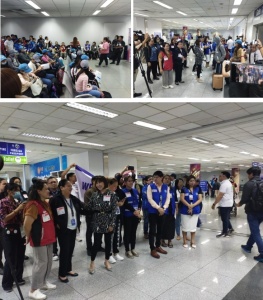 Social workers from the Department of Social Welfare and Development (DSWD) join representatives of other government agencies as they welcome and assist the repatriated Overseas Filipino Workers (OFW) from Israel on Friday (October 20) at the Ninoy Aquino International Airport.